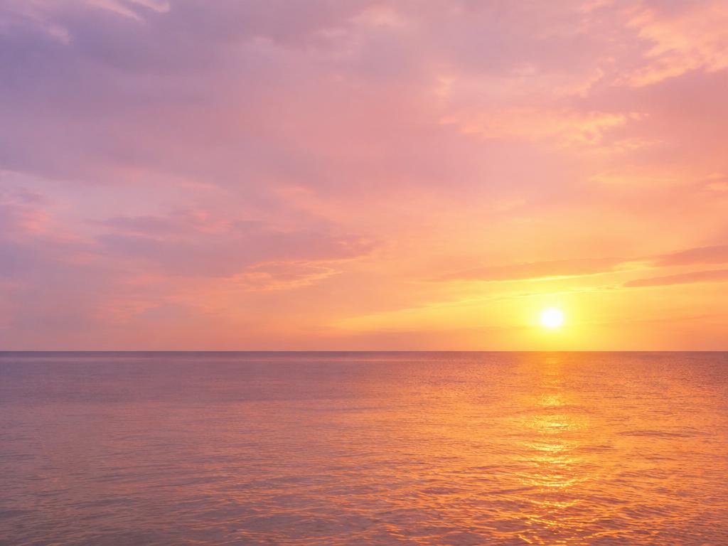 Pink and golden sunset over the sea